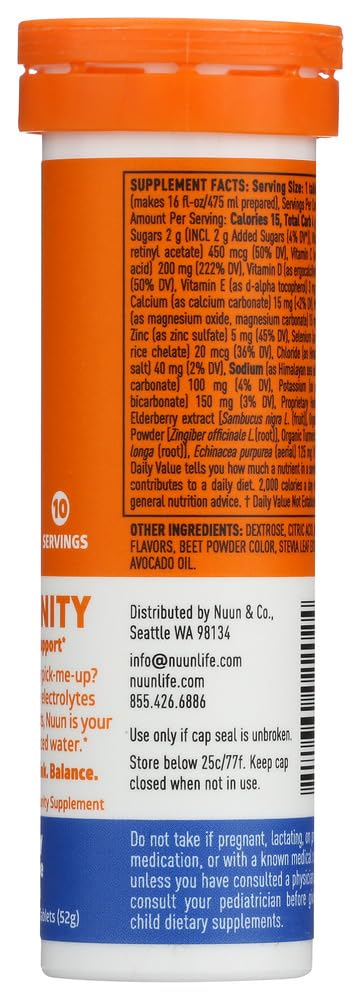 Nuun Immunity verre d'eau avec tablette, goût fruité et hydratation facile.