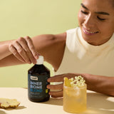 Verre doseur pour faciliter la prise du Inner Biome Blend