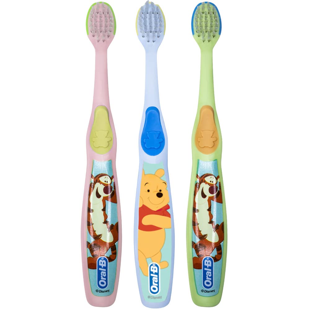 Brosse Oral-B bébé Pooh, poils extra-doux pour petites dents.