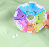 Organisateur pilules semaine 7 jours rond format compact, idéal pour voyager.