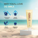 Organo OG Smile, pâte dentifrice menthe sur brosse, offrant fraîcheur et douceur lors du brossage.