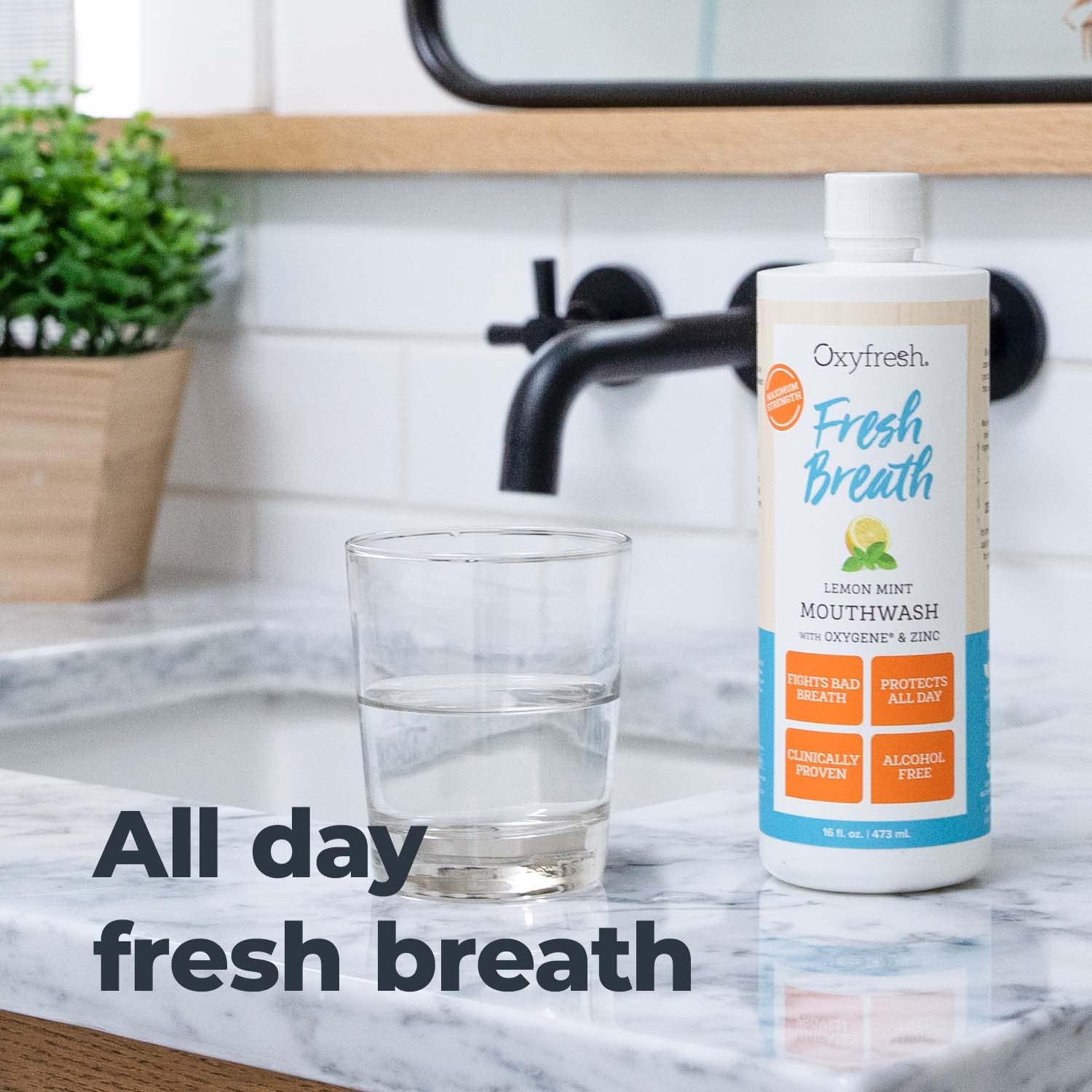 Gouttes visibles d'extraits naturels Oxyfresh Limon-Menthe, fraîcheur durable après usage.