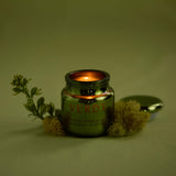 Bougie Paddywax Chroma, verre metallique argenté, parfum frais pour salon accueillant.