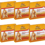 Pansement Tiger Balm appliqué sur épaule pour soulagement ciblé.