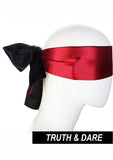 Masque Pastos: détails-motif en satin rouge, design élégant favorisant la détente.