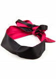 Masque Pastos: voyage, satin rouge, compact et léger pour les déplacements.