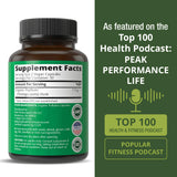 Capsules Peak Performance psyllium près d'un verre d'eau, dosage quotidien pratique.