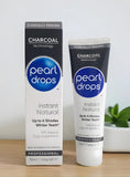 Emballage compact Pearl Drops Charbon Actif Blanc Instant pratique en voyage.