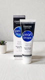 Étiquette et emballage Pearl Drops Charbon Actif Blanc Instant au design élégant.
