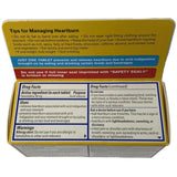 Main tenant une tablette Pepcid AC CSC24, prise discrète et rapide
