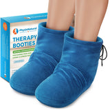 PhysioNatural chaussons chauffants pieds près du canapé pour chaleur rapide et relaxation