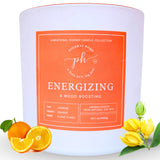 Podaras Home Bougie Extra Large emballage élégant pour une ambiance énergisante.