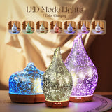 Porseme diffuseur-verre argenté et base bois apporte élégance au salon.