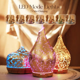 Porseme diffuseur-verre-souffle-or-base-bois, design élégant et atmosphère chaleureuse.