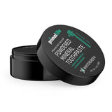 Primal Life Organics Dirty Mouth Toothpowder contient hydroxyapatite pour un éclat naturel.