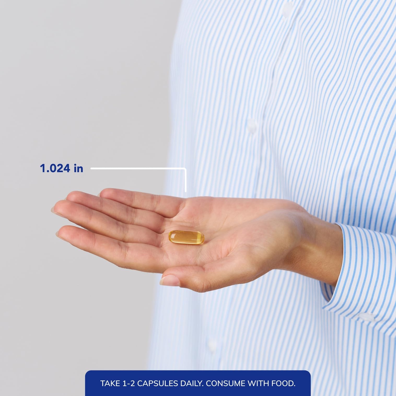Prise quotidienne des capsules Pure Encapsulations pour routine Oméga-3.