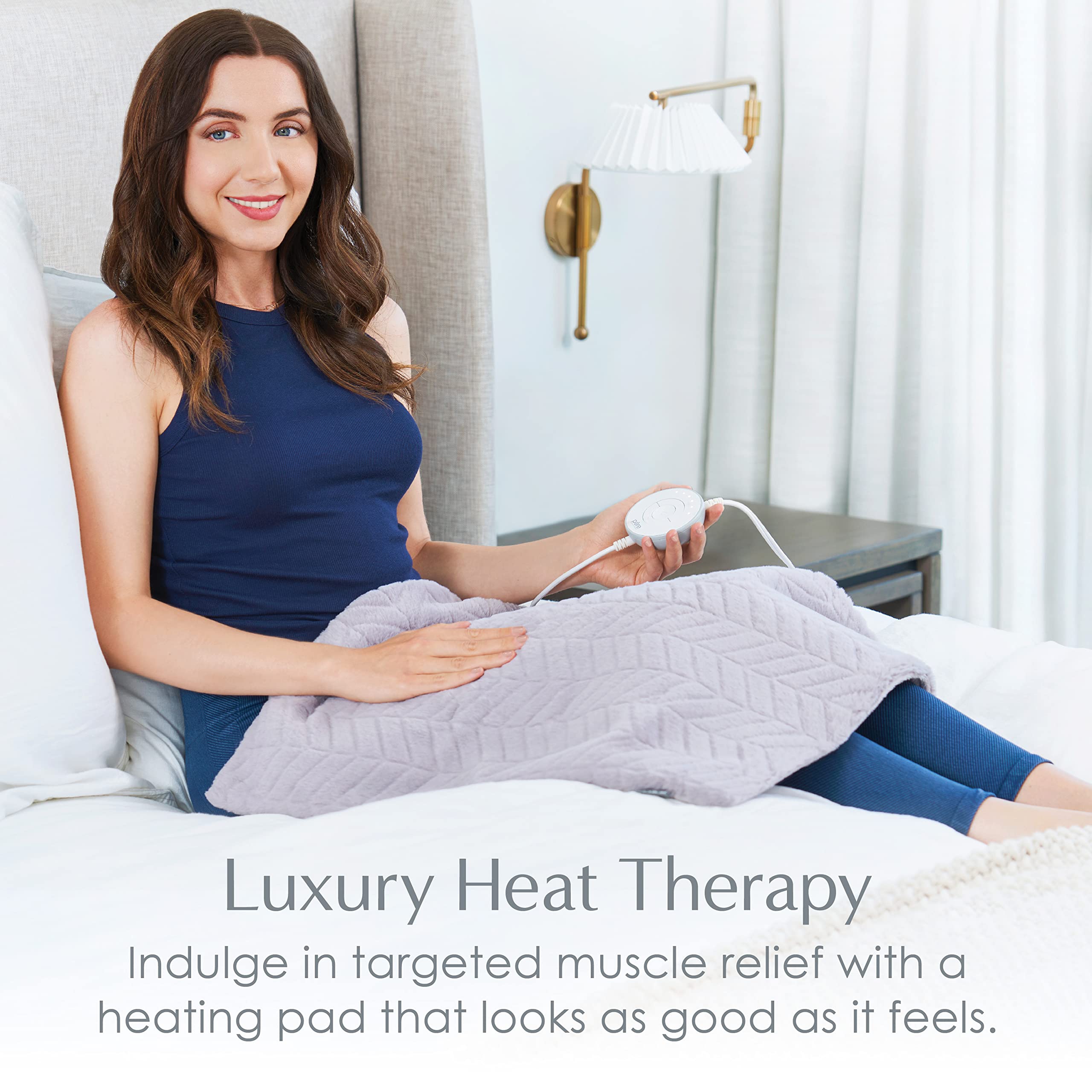Pure Enrichment PureRadiance avec contrôleur circulaire ergonomique et six niveaux de chaleur.