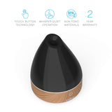 Finitions bois-grain du PureSpa noir intégrées à votre déco.