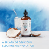 Pure Inventions gouttes infusion mangue coco — eau infusée aromatique dans un verre
