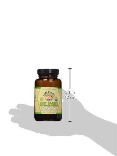 Poudre fine Pure Planet Just Barley prête à être ajoutée à une boisson.