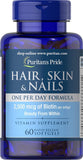 Puritan's Pride – Bouteille de gélules, soutien potentiel pour cheveux sains et peau éclatante.