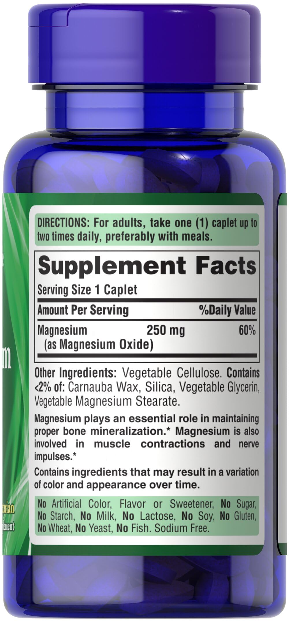Puritan's Pride Magnésium 250 mg caplets, emballage ouvert, étiquette et composition visibles pour une utilisation quotidienne.