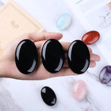QINJIEJIE détail texture obsidienne noire avec nuances uniques et sensorialité.