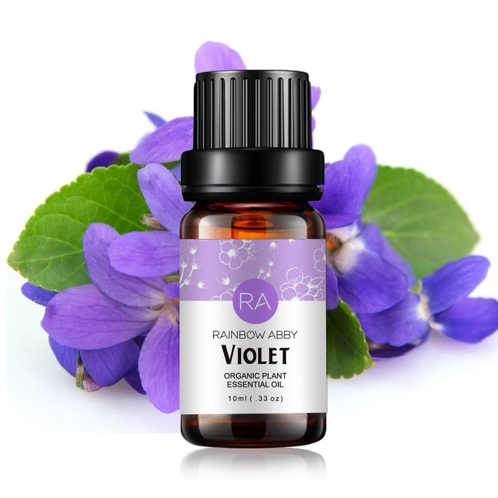 Huile essentielle violette Rainbow Abby dans une bouteille, idéale pour créer une ambiance aromatique.