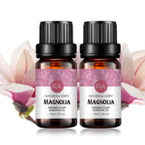 Rainbow Abby Magnolia — huile essentielle en bouteille sombre pour diffusion apaisante.
