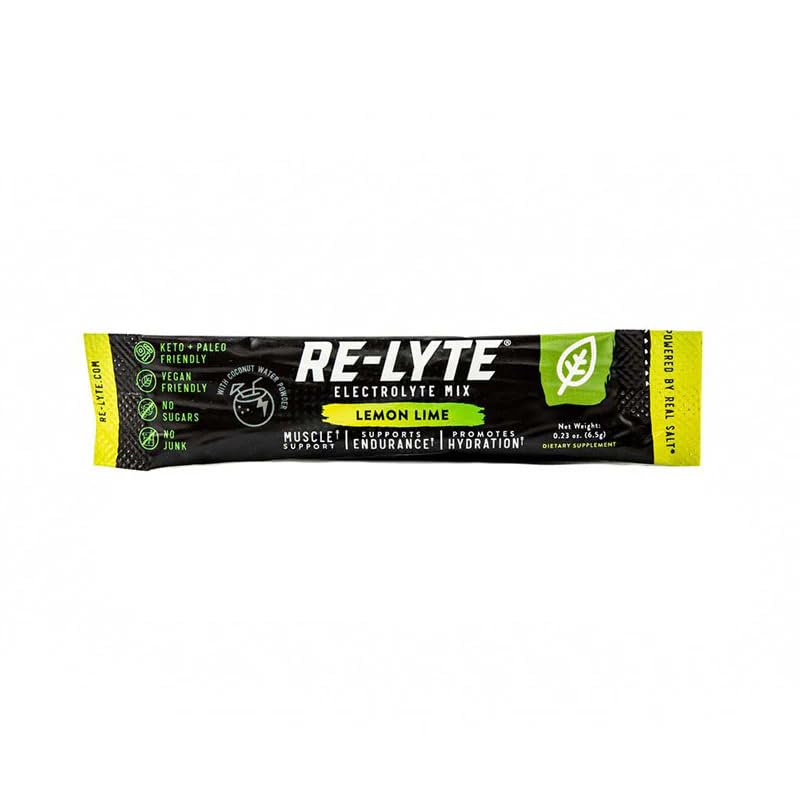 RELYTE poudre électrolytique citron-vert, gros plan sur texture légère et fraîche.