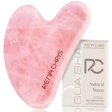 Outil Gua Sha Rena Chris en quartz rose pour le visage, stimulant la circulation et la clarté cutanée.