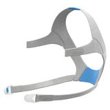 ResMed AirFit AirTouch F20, harnais-tete bleu offrant un confort accru.