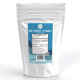 Revitalize Wellness Poudre Fine de Vitamine C dans son pot prête à être mélangée.