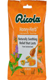 Boîte de pastilles Ricola miel et herbes, pratique à emporter en déplacement.