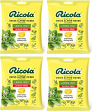 Ricola citron-menthe sans sucre, boîtes alignées, goût rafraîchissant pour apaiser la gorge.