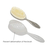 Brosse RUMIUSE idéale sur cheveux mouillés ou secs pour démêler.