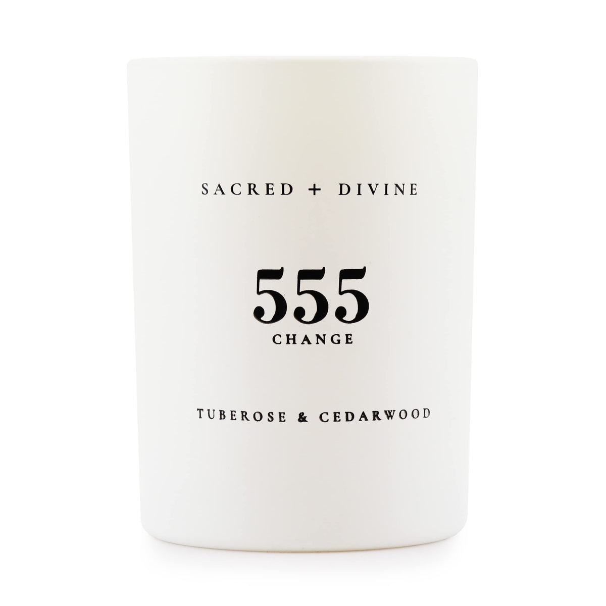 Bougie Sacred + Divine 555 Change avec tubéreuse et cèdre, focalisée sur l’intention du jour.