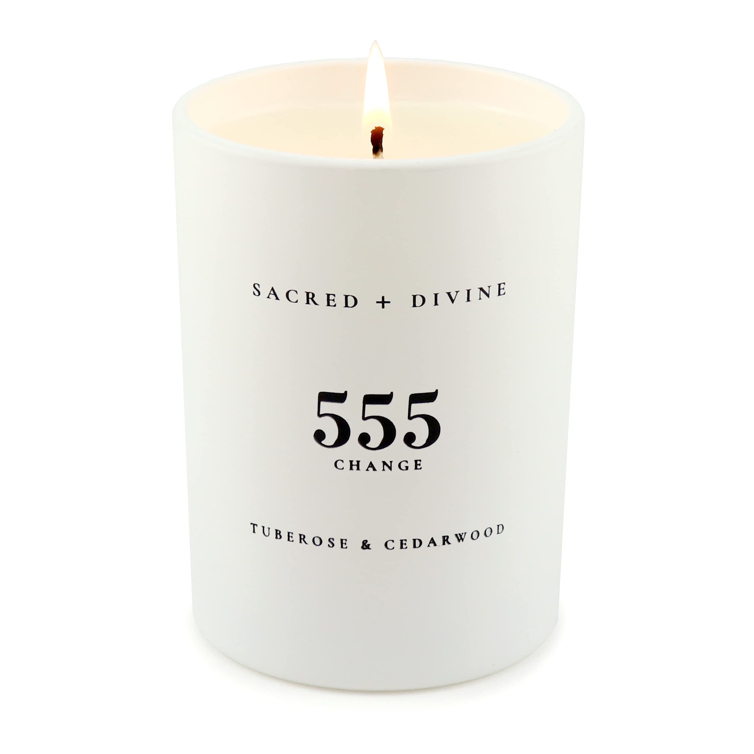 Bougie Sacred + Divine 555 Change dans son verre blanc minimaliste pour méditation.