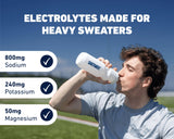 Saltivate Électrolytes Mangue-Ananas dans un verre, hydratation tropicale après l’effort