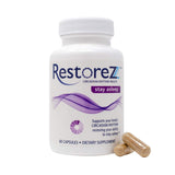 Gélules RestoreZ Stay Asleep en main, solution naturelle pour rester endormi.