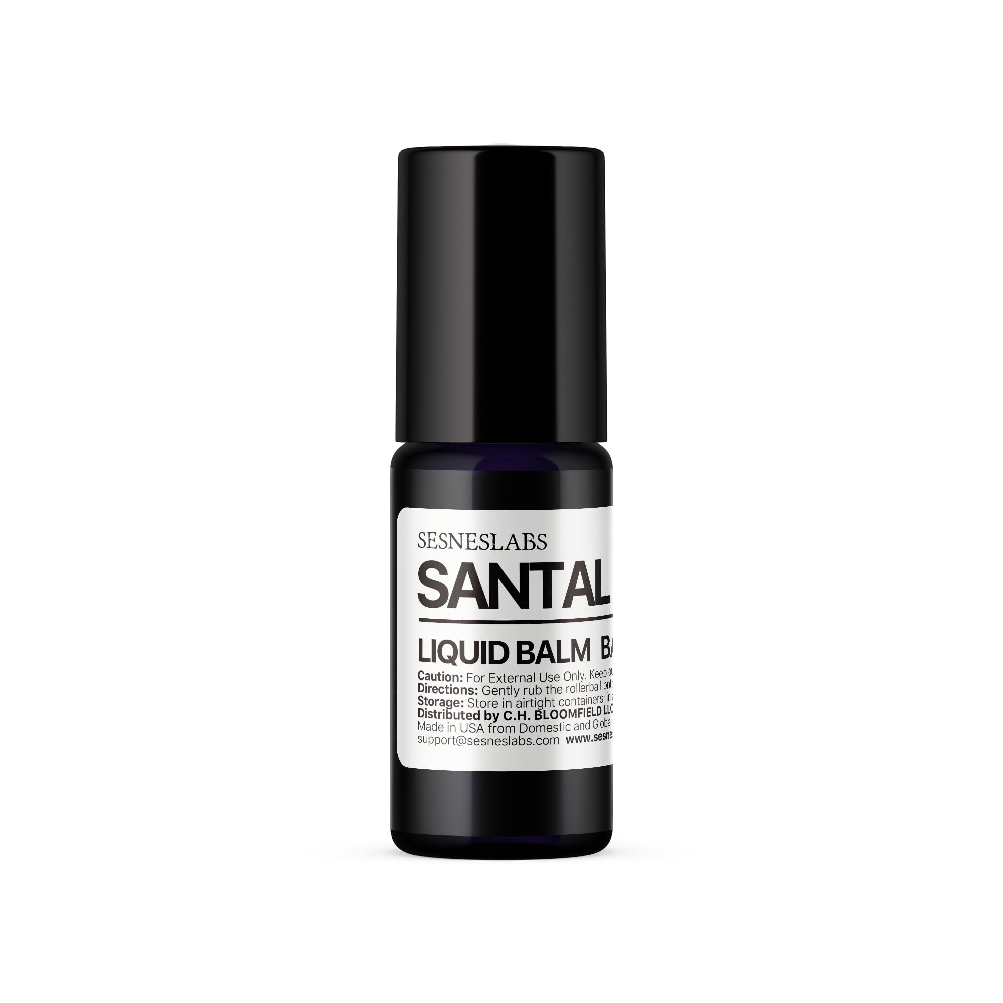 Sesneslabs Santal Grass Roll-On appliqué sur peau, application précise et propre.