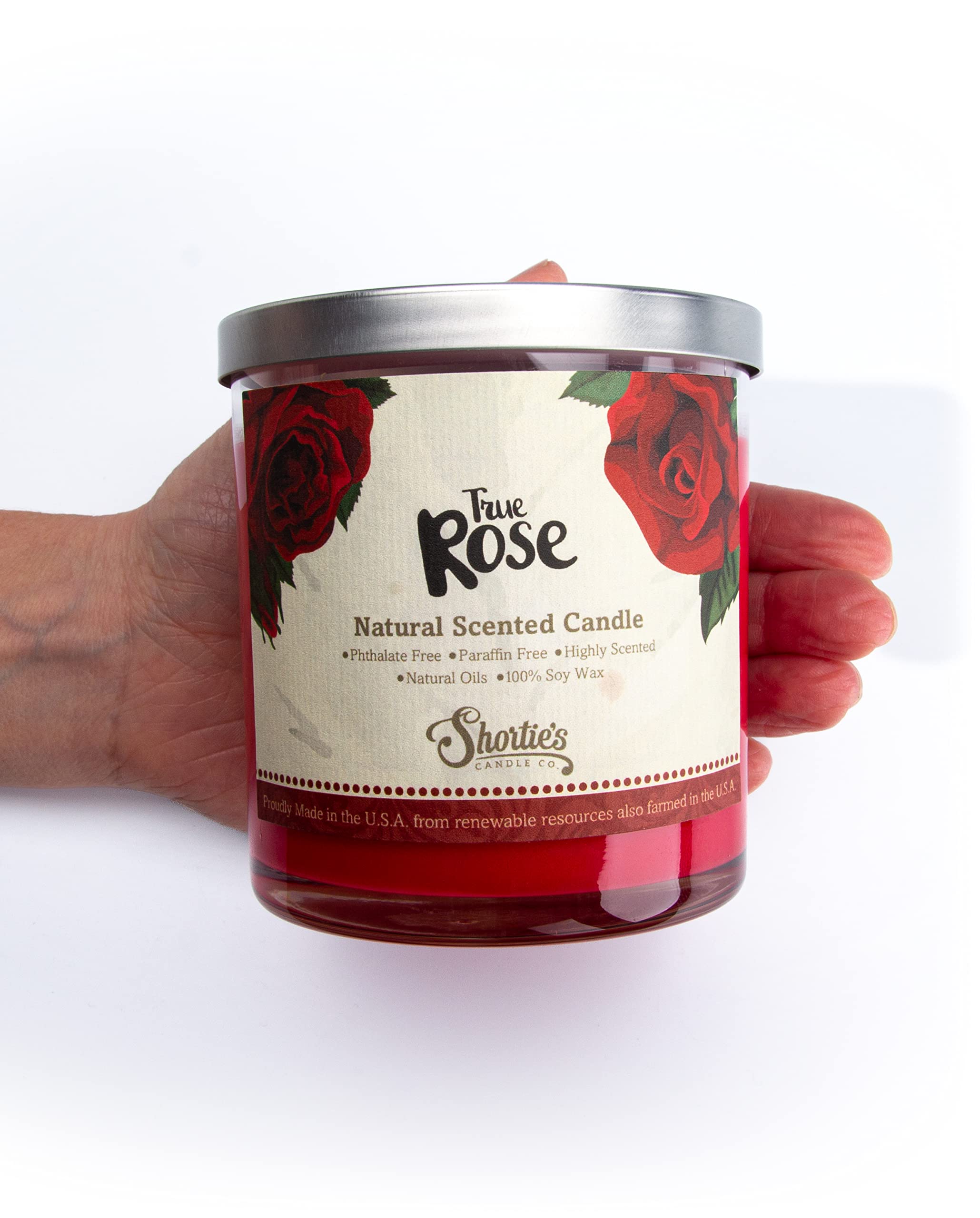 Bougie Shortie's Rose éclairage chaleureux et mèche naturelle.