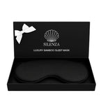 Masque de sommeil Silenza en bambou onyx, douceur luxueuse et blocage lumineux.