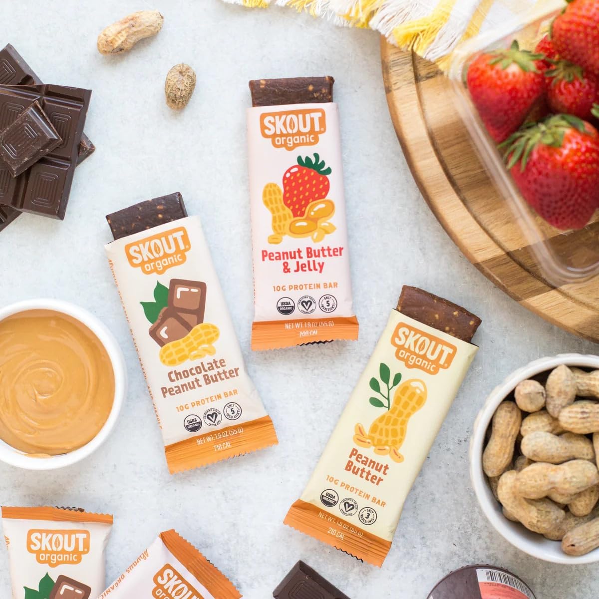 Trois saveurs distinctes presentes visuellement dans le pack Skout.