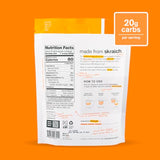 Poudre d'hydratation Skratch Labs : cuillère-dose orange facilite la réhydratation rapide