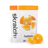 Poudre d'hydratation Skratch Labs : sachet orange prêt à diluer après l'entraînement