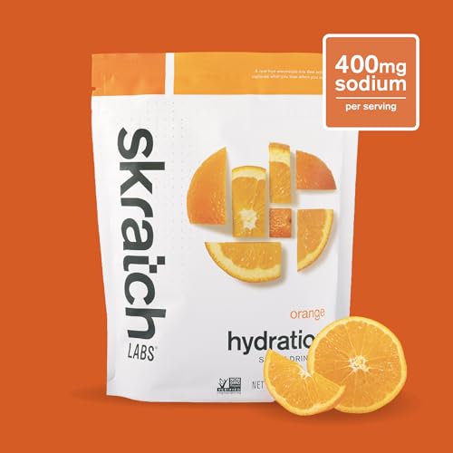 Poudre d'hydratation Skratch Labs : verre d'eau orange prêt à boire après l'effort
