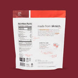 Skratch Labs Récupération – Mélange Fraises-Crème dans l'eau, goût rafraîchissant.