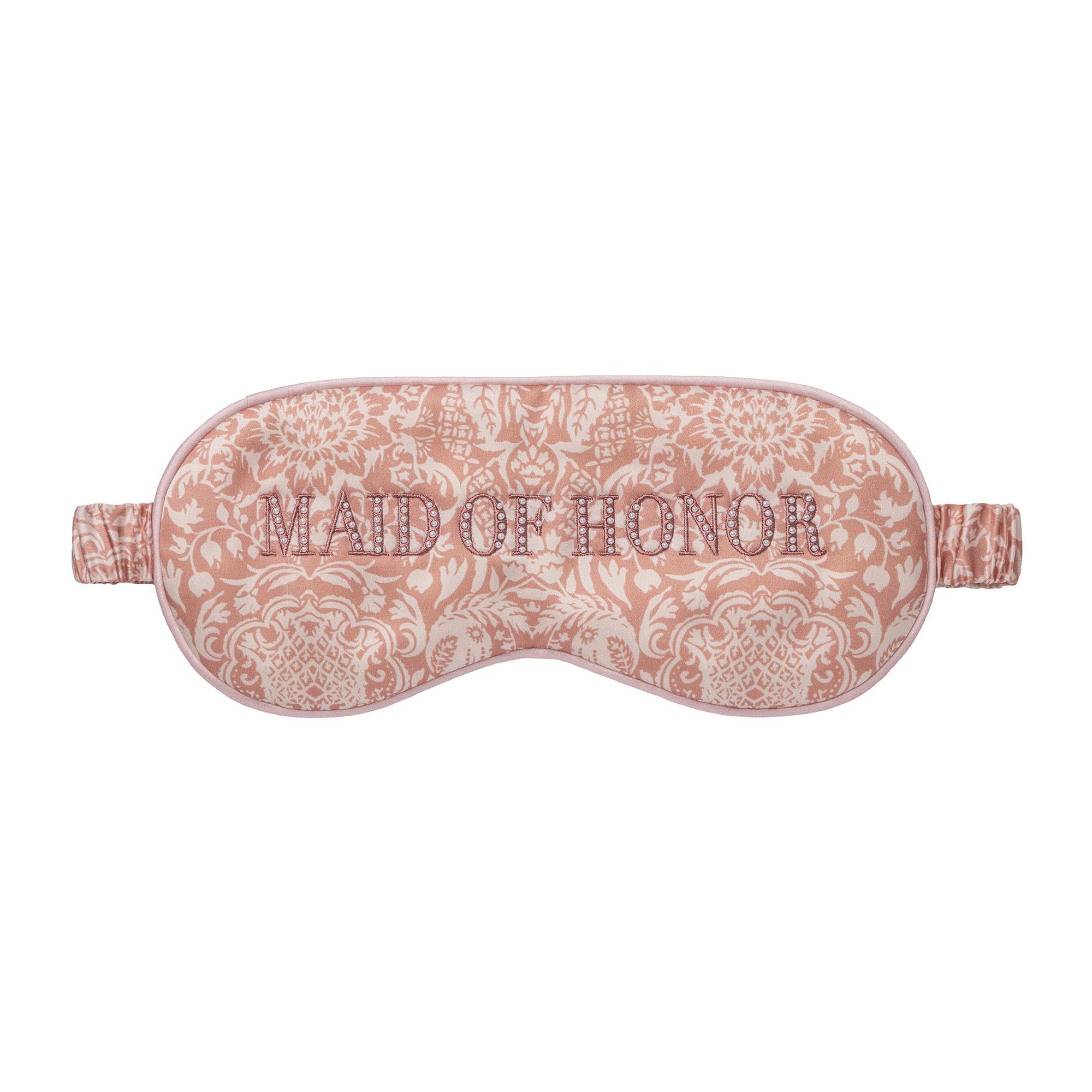 Détail broderie Slip pour une touche chic lors des préparatifs nuptiaux.