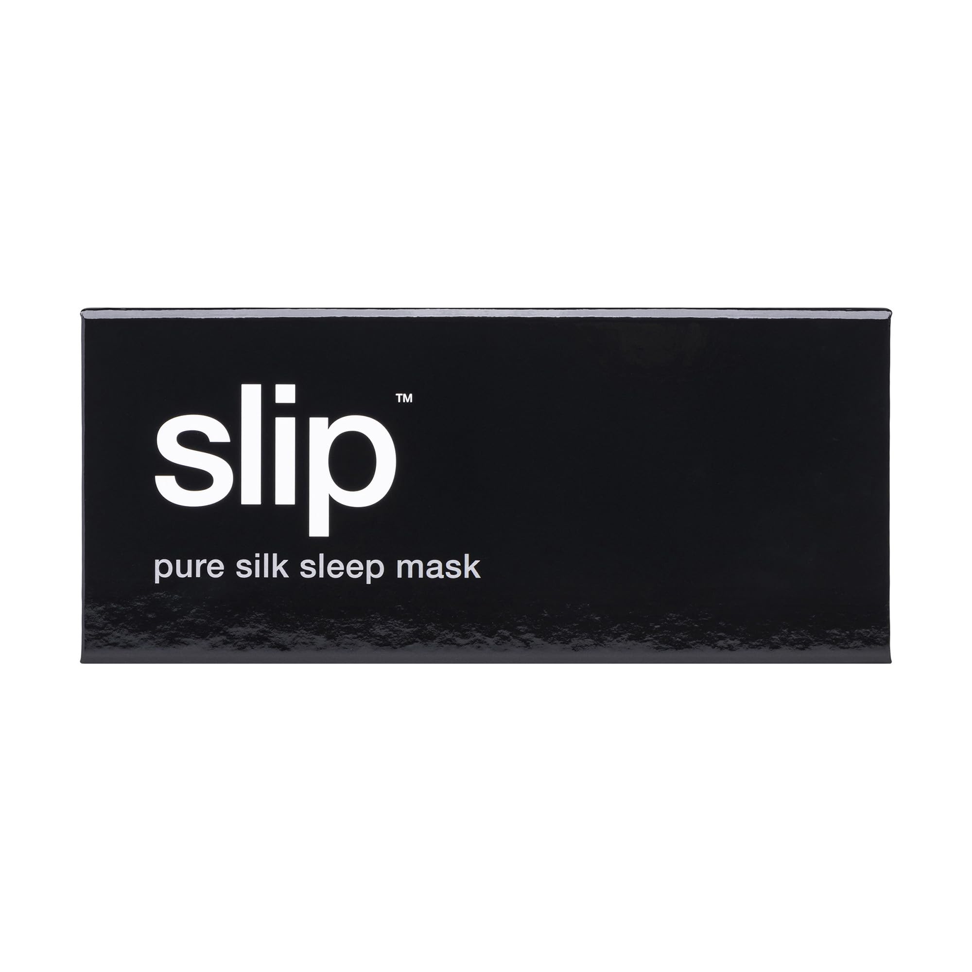 Détail doux du masque Slip en soie noire, soin de la peau et des cheveux.